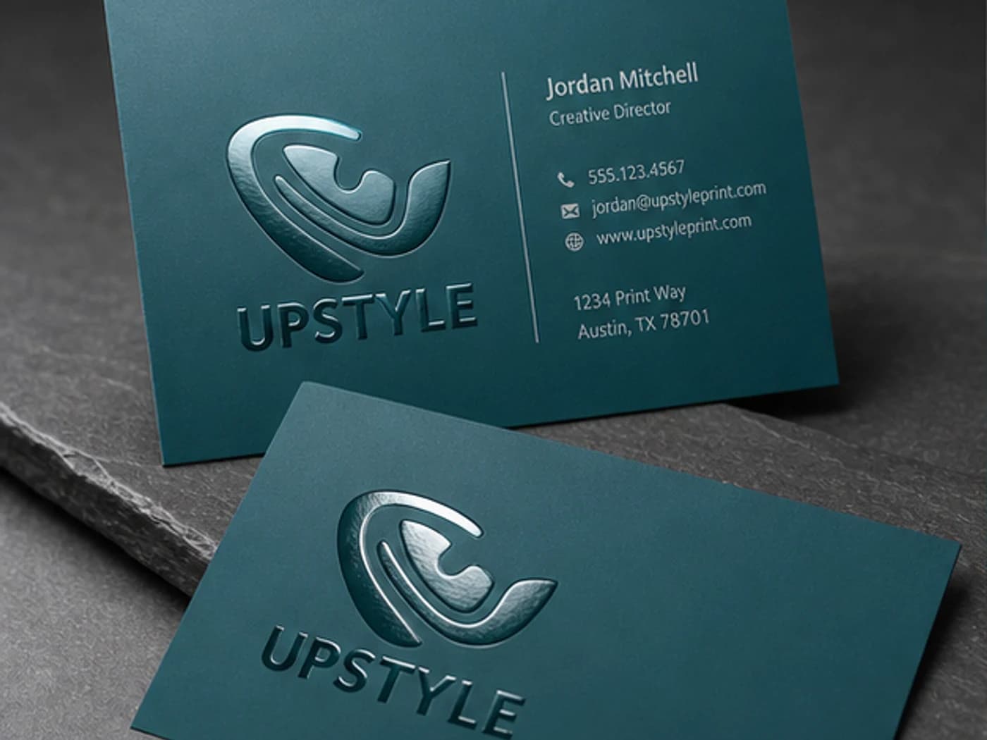 Premium business cards with silk and spot UV finish options.