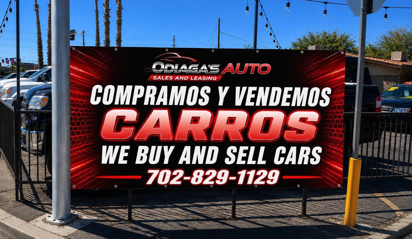 Completed Odiaga's Auto bilingual banner installed over the exterior wall.