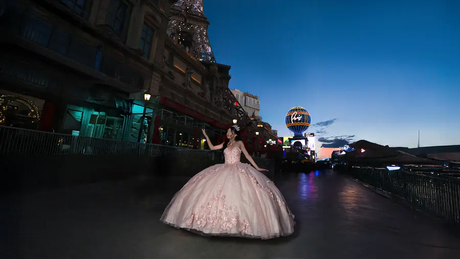 Quinceanera portrait on a Las Vegas street at blue hour.